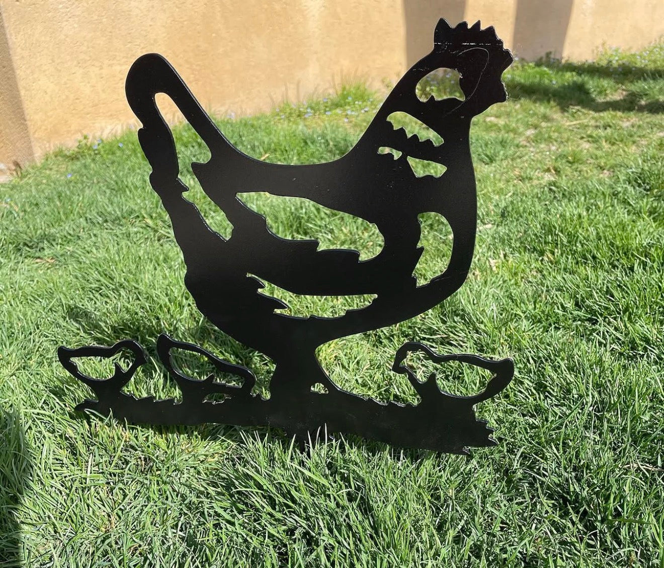 Poule avec ses poussins
