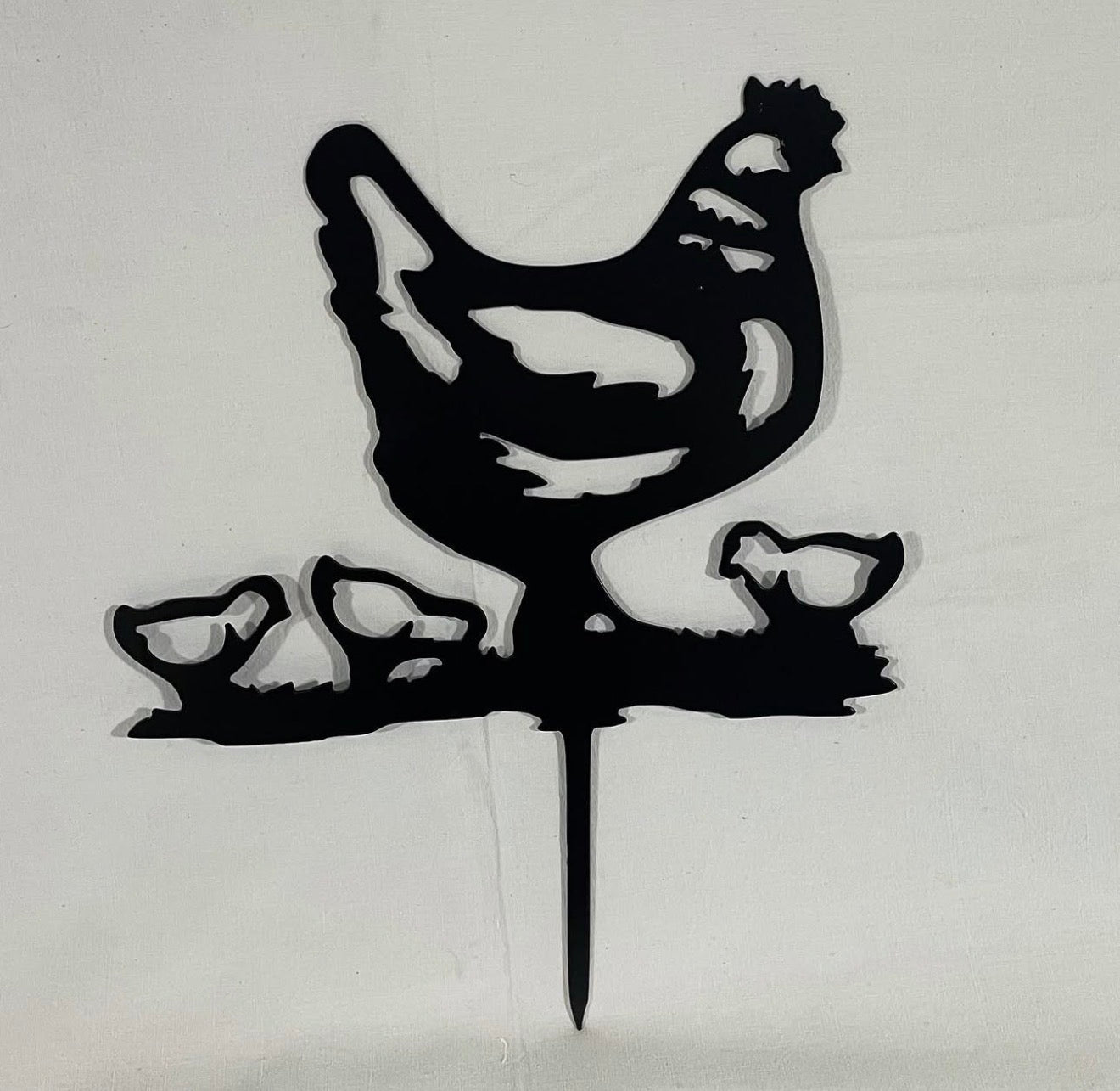 Poule avec ses poussins
